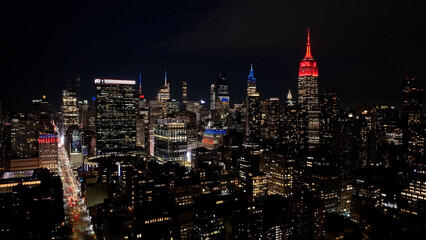 Fototapeta premium Night View Of Downtown New York At Manhattan In New York United States. City At Night Landscape. Illuminated Downtown. Downtown New York At New York United States. Empire State Building. 
