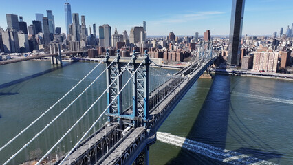 Fototapeta premium Manhattan Bridge At Manhattan In New York United States. Highrise Buildings Scenery. Cable Bridge Landscape. Manhattan Bridge At New York United States. Freeway Road Background. 