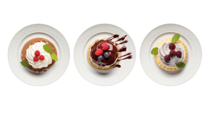 Three plates displaying different desserts with toppings on a white background and a high angle view