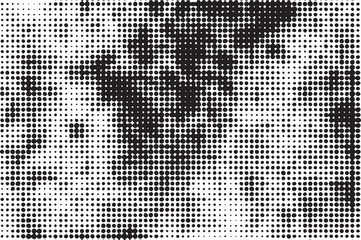 Fototapeta premium A close-up portrait reveals a textured face constructed from numerous small black and white dots.