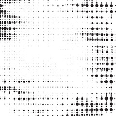 A densely packed arrangement of numerous black and white dots creates a textured
