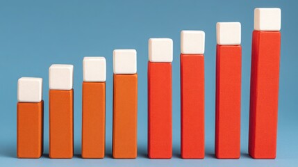 Fototapeta premium Row of orange and white blocks representing multi-asset price comparison panel for financial analysis and evaluation