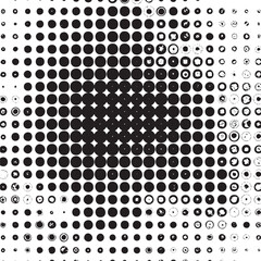 Naklejka premium A dense arrangement of black and white circles creates a dynamic abstract