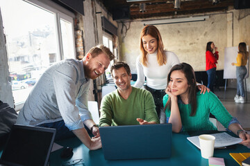 Obraz premium Young software developers in coworking open space