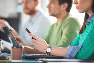 Young software developers in coworking open space