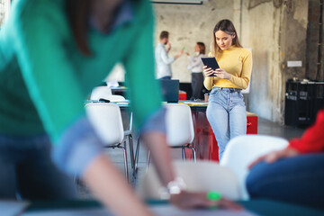 Young software developers in coworking open space