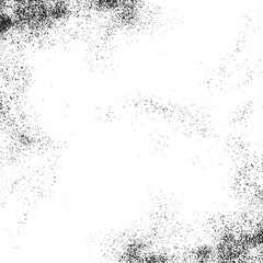 Obraz premium A textured white background with scattered dark particles creates a dynamic and abstract visual.