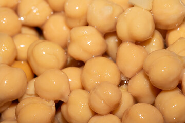 Close up of chickpeas beans being drained in a sieve