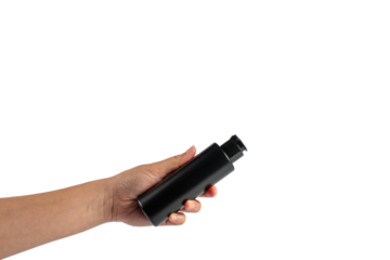 Black cosmetic flip top bottle in hand isolated on transparent background.
