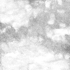 A dense textured of small white dots against a black background.