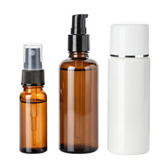 Three cosmetic bottles in various sizes and shapes.