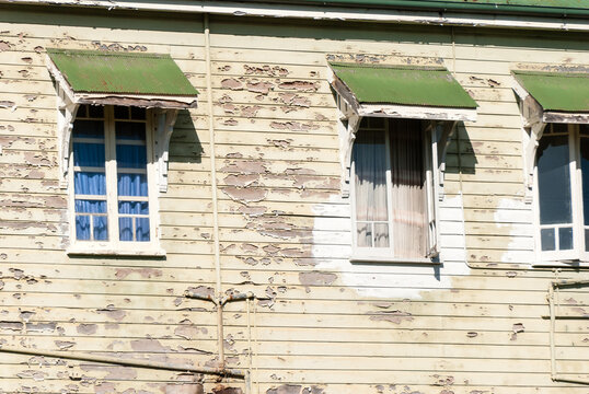 Close up of Paint Peeling on the side of an old Queenslander style House