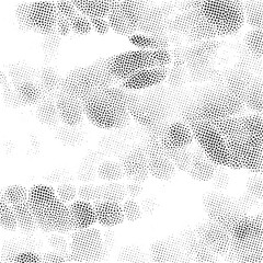 A dense of small dark dots covers a white background.