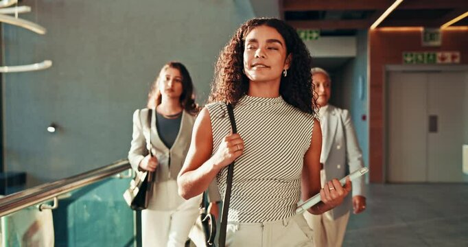 Business, woman and walking with tablet in lobby for travel, conference and corporate journey. Group, people or female empowerment for tradeshow, career convention and keynote speaker of seminar trip