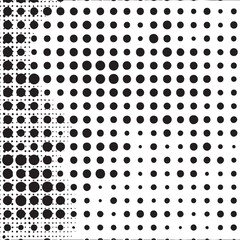 A seamless of uniformly sized black and white circles transitions from dense to sparse.