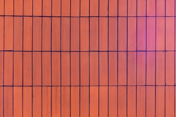 Red brick walls arranged vertically