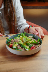 Fresh salad with dressing for lunch