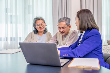 asian senior couple concentrate to listening salesperson or bank employee who using laptop...
