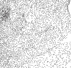A dense field of small dark dots gradually transitions to a lighter background.