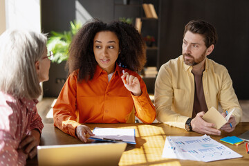 Marketing team discussing new project during business meeting