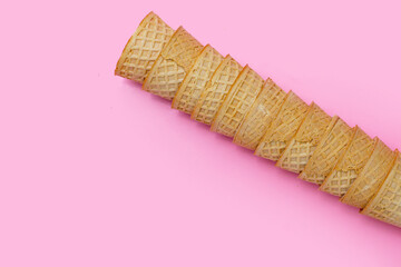 Waffle cones on pink background