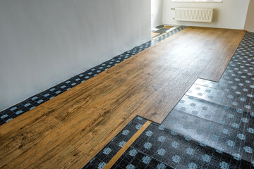 Installation of new laminate or vinyl flooring