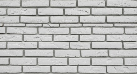 Textured white brick wall laid in a clean running bond with variation in brick sizes