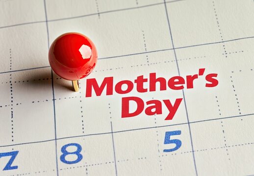 Red pushpin marks Mother's Day on a calendar page.  The date 5 is visible