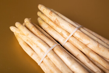 High-quality image of two bunches of fresh white asparagus, perfect for recipes and culinary websites.