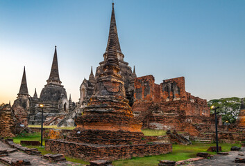 Fototapeta premium Ayutthaya Temple ruins at sunset,within the ancient Royal Palace complex,Thailand.