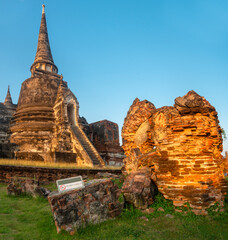 Ayutthaya temple pagoda and section of old wall, at the ancient Royal Palace complex,Thailand.