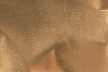 High-resolution image of a scratched gold metal texture. Perfect for backgrounds and design...