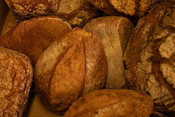Close-up of rustic sourdough bread loaves. Perfect for bakery websites or food blogs.