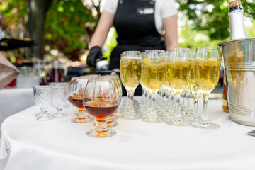 buffet, glasses of cognac and champagne