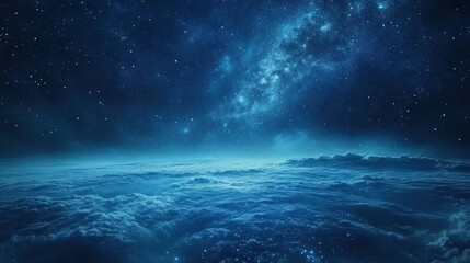 Fototapeta premium Stunning night sky view above a sea of clouds, with a brilliant Milky Way galaxy.