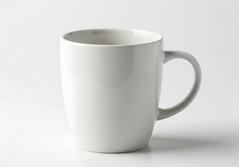 Obraz premium A simple white ceramic mug with a handle on a plain white background in a studio setting shot close up