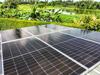 Installing solar panels on the roof to use as alternative energy for electricity.