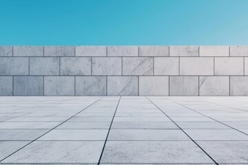 Fototapeta premium Empty square with stone wall and blue sky background