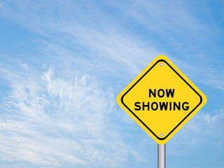 Yellow transportation sign with word now showing on blue color sky background