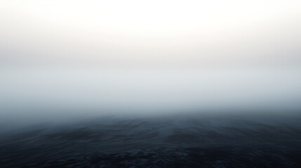 Fototapeta premium A foggy sky with a large body of water in the background