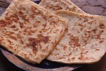 A close-up of the traditional Moroccan flatbread known as msemmen or msemen
