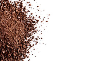 Close-up of a pile of finely ground, dark brown powder, cascading slightly off the edge of the frame, against a pure white background.  It appears to be a type of ground spice or coffee grounds