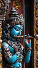 Statue of Deity Playing Flute