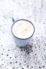 Cappuccino on bright background. Soft focus. Copy space	