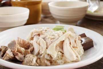 Steamed rice topped with chicken Singapore street food