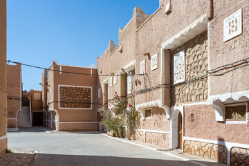 Traditional architecture of Ghardaïa, Algeria – View of the mud houses and minaret of the old town
