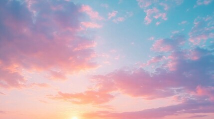 Obraz premium Soft pastel sunset sky with fluffy clouds