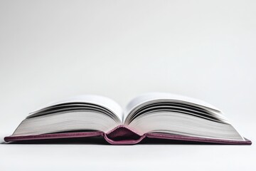 Open book, pages spread, purple cover.  Inside, white paper, showing blank pages