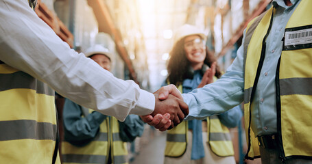 Warehouse, shipping deal and people with handshake for agreement, applause or partnership. Logistics team, collaboration or workers shaking hands for supply chain, distribution or thank you for stock