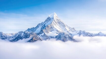 Majestic snow-capped peak above a sea of clouds